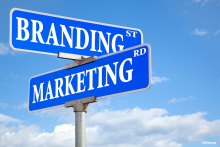 Why Consistent Branding Matters for Voice Actors Two blue street signs against a sky background. One says Branding, the other says Marketing.
